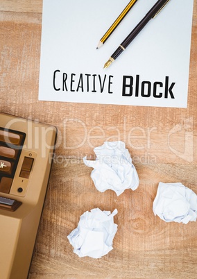 Creative block  text written on page with typewriter and crumpled paper