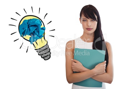 Woman standing next to light bulb with crumpled paper ball