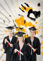 Happy young students holding diplomas against grey, yellow and black splattered background