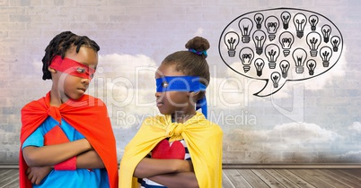 Superhero kids with cloudy sky wall with light bulb chat bubble