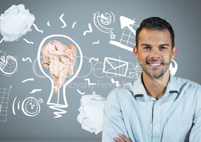 Man standing next to light bulb with crumpled paper ball