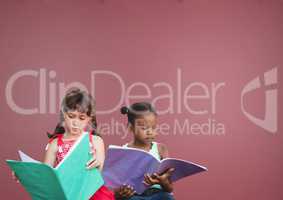 Kids reading in front of pink background