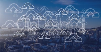 City with cloud upload icons