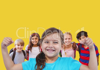 Girl flexing muscles with friends in front of yellow background