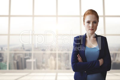 Business woman standing against building background