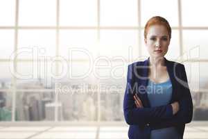 Business woman standing against building background