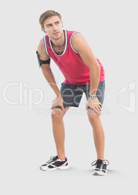Full body portrait of athletic Man standing with grey background