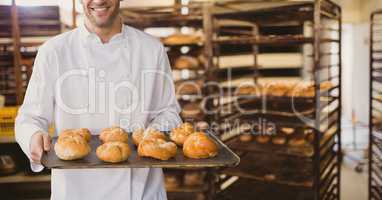 Happy small business owner man holding bread