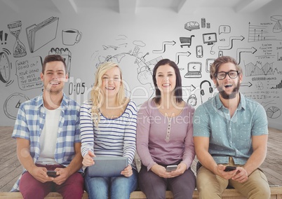 Group of people sitting with devices in front of room with graphics drawings