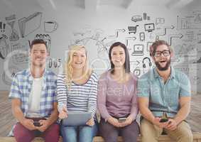 Group of people sitting with devices in front of room with graphics drawings