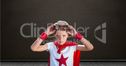 Superhero boy with blackboard background