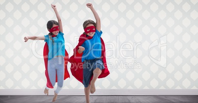 Superhero kids in room