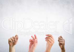 Four hands with bright background