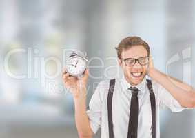 man holding clock in front of bright background