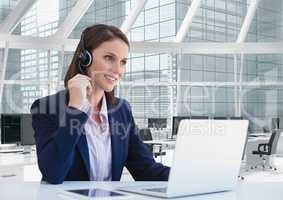 Happy customer care representative woman against office background