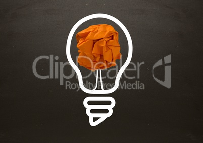 light bulb with crumpled paper ball in front of blackboard