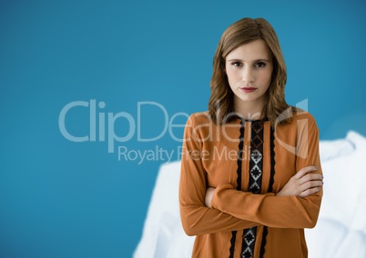 Woman standing with blue background