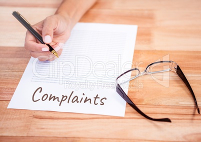 Complaints  text written on page with glasses