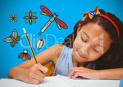 Girl writing in front of blue blank background with magical nature graphics