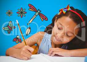 Girl writing in front of blue blank background with magical nature graphics
