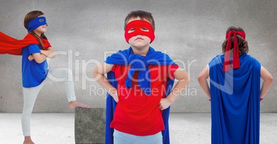 Superhero kids in grey room