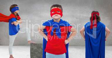 Superhero kids in grey room