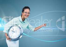 Woman holding clock in front of blue curved background