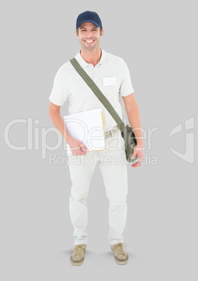 Full body portrait of courier Man standing with grey background