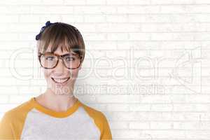 Happy business woman standing against white wall background