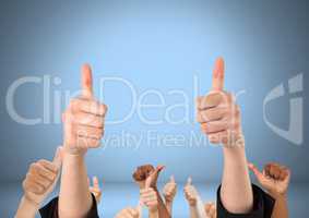 Hands with thumbs up likes in front of blue background