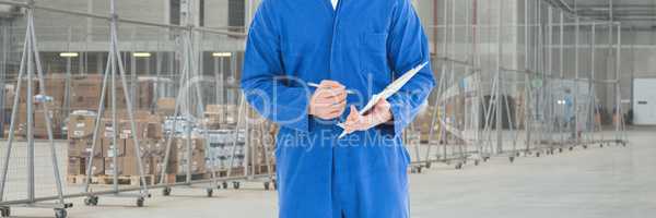 Mechanic man holding a pen and a folder