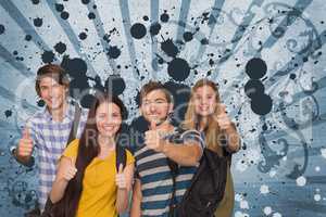 Happy young students against blue splattered background