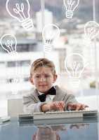 Office kid boy using the computer against background with bulbs icons