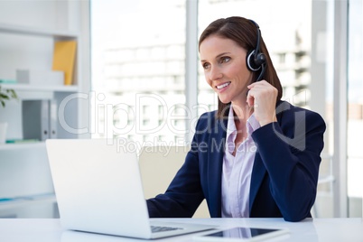 Happy customer care representative woman against office background