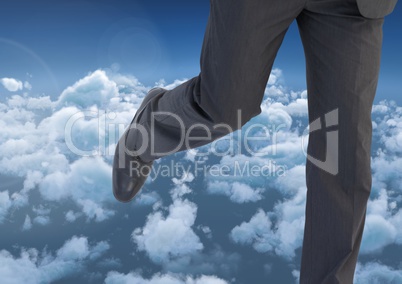 Businessman's legs running in cloud sky