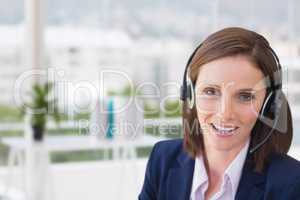 Customer care representative woman against office background