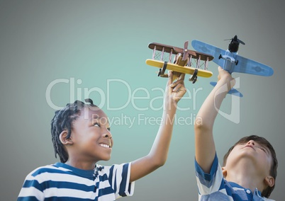 kids playing with toy planes together with blank background