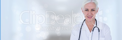 Doctor woman standing against white background