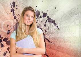 Happy young student woman holding folders against white, red and purple splattered background