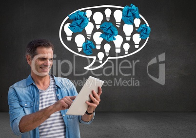 Man on tablet standing next to light bulbs in chat bubble with crumpled paper balls in front of blac