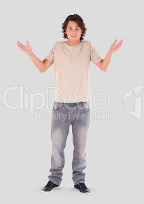 Full body portrait of young Man standing with grey background