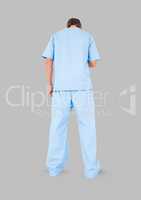 Full body portrait of medical nurse man standing with grey background