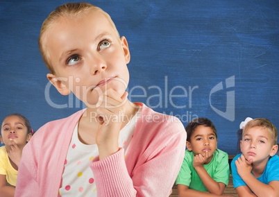 Girl thinking in front of friends and blue wall