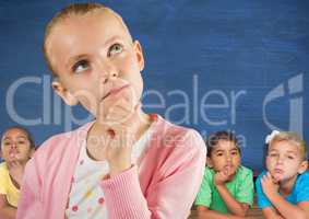 Girl thinking in front of friends and blue wall