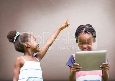 kids on tablet with blank brown background