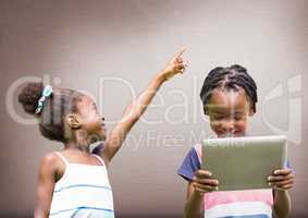 kids on tablet with blank brown background