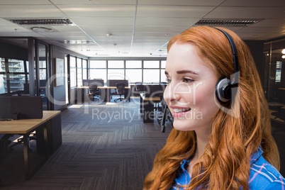Happy customer care representative woman against office background