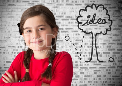 Girl in front of brick wall with idea tree graphics