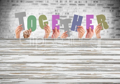 together text letter cut out in front of brick wall
