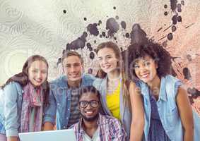 Happy young students using a computer against white, red and purple splattered background